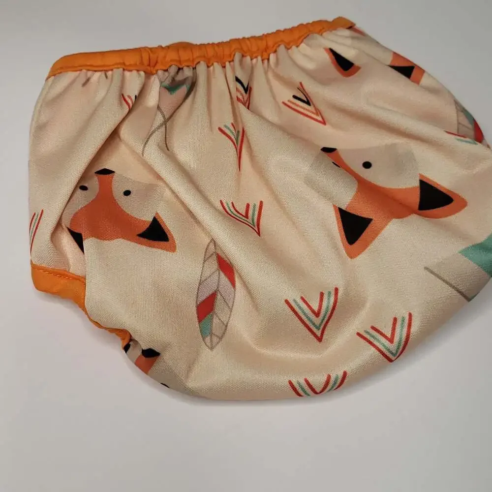 Adjustable Orange-Trim Diaper Cover with Geometric Feather Print